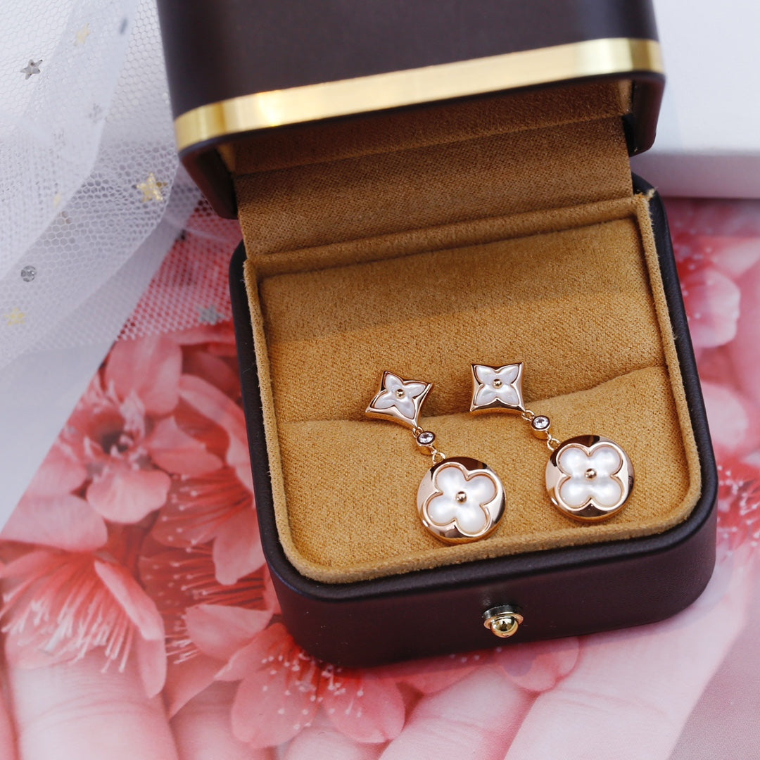 [NOVO]Ohrringe mit Stern und Sonne in Rosa-Gold